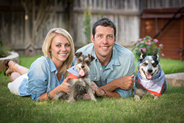 portrait of young couple with dogs