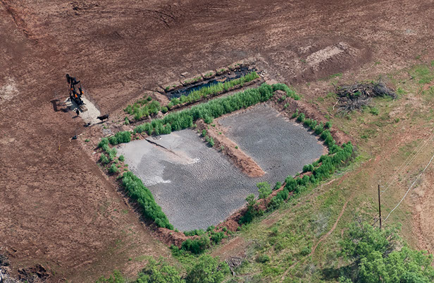 Aerial photo of Sludge Pond at Oil Drilling Site
