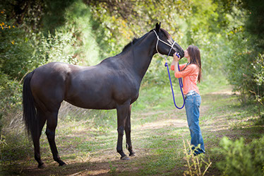 Senior portrait of girl with her horse